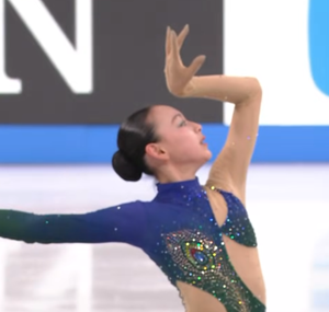 岡万佑子　ジュニアグランプリファイナル2025　ショート演技　(解説：英語)